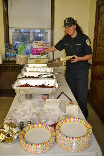 Kristin Norwood getting the serving trays ready